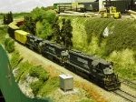NS local pulls paper mill train heavy with woodchips near Opelika, AL